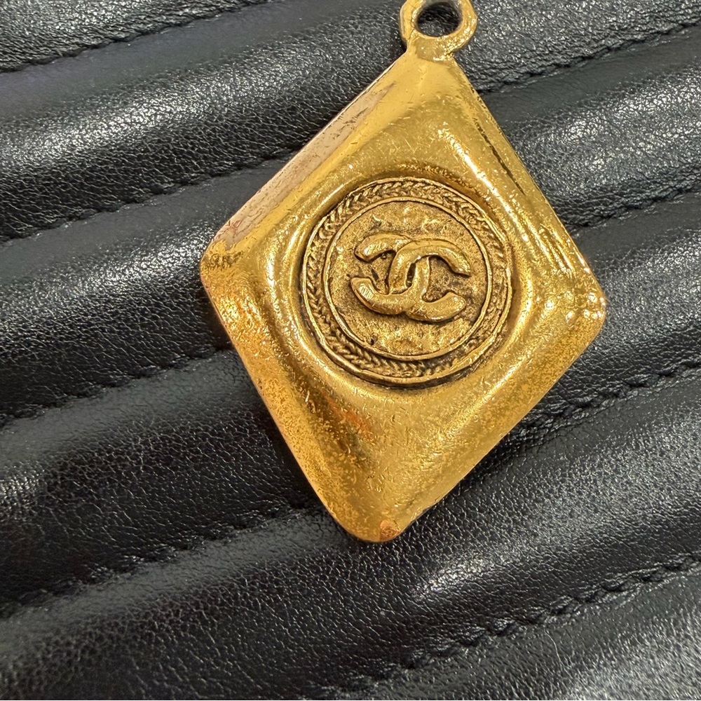 CHANEL vintage gold toned Coco Mark pendant